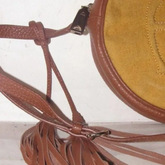Etienne Aigner, 1970's- 1980's, yellow canvas and brown leather round canteen style cross body or shoulder bag