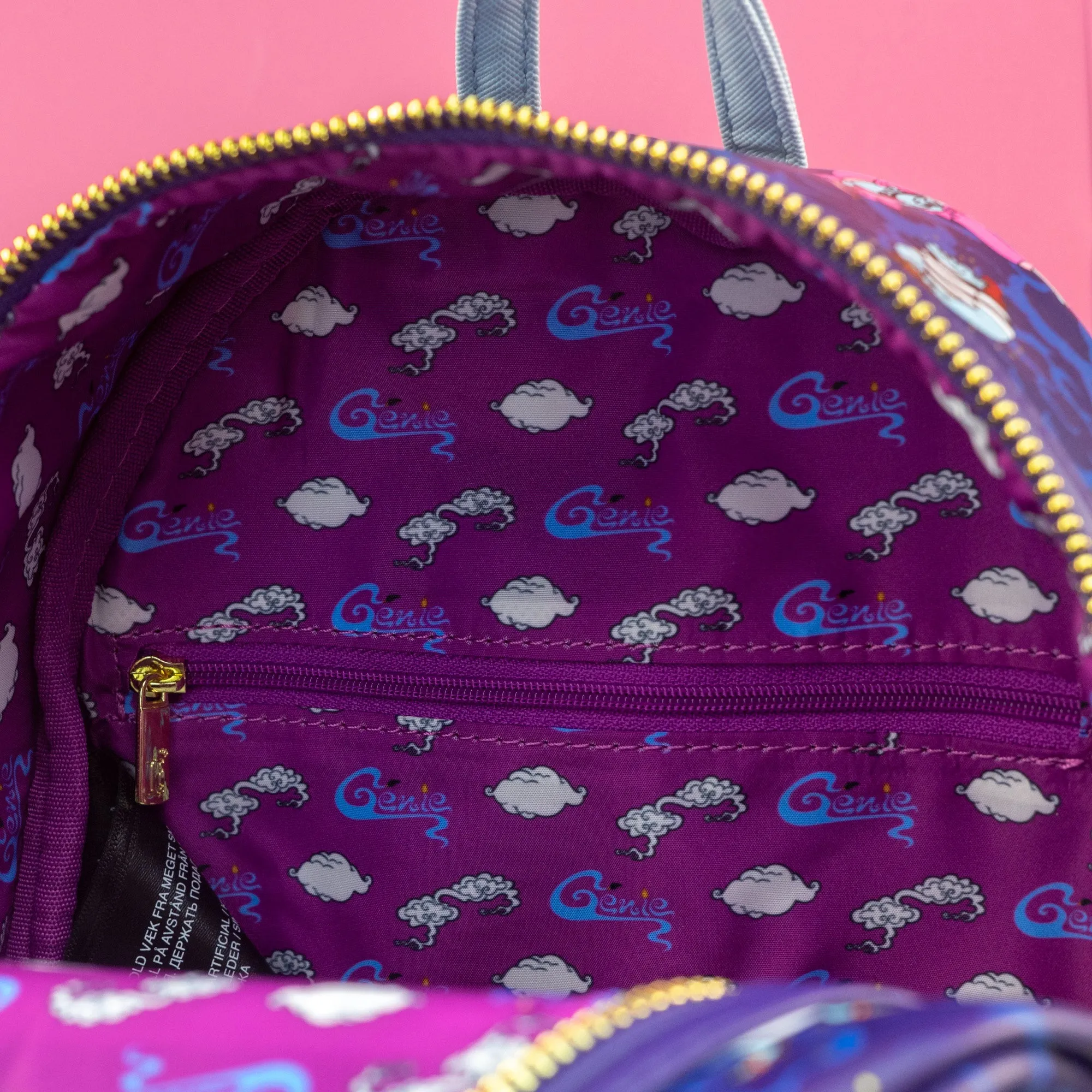 Loungefly x Disney Aladdin The Genie Transformations AOP Mini Backpack