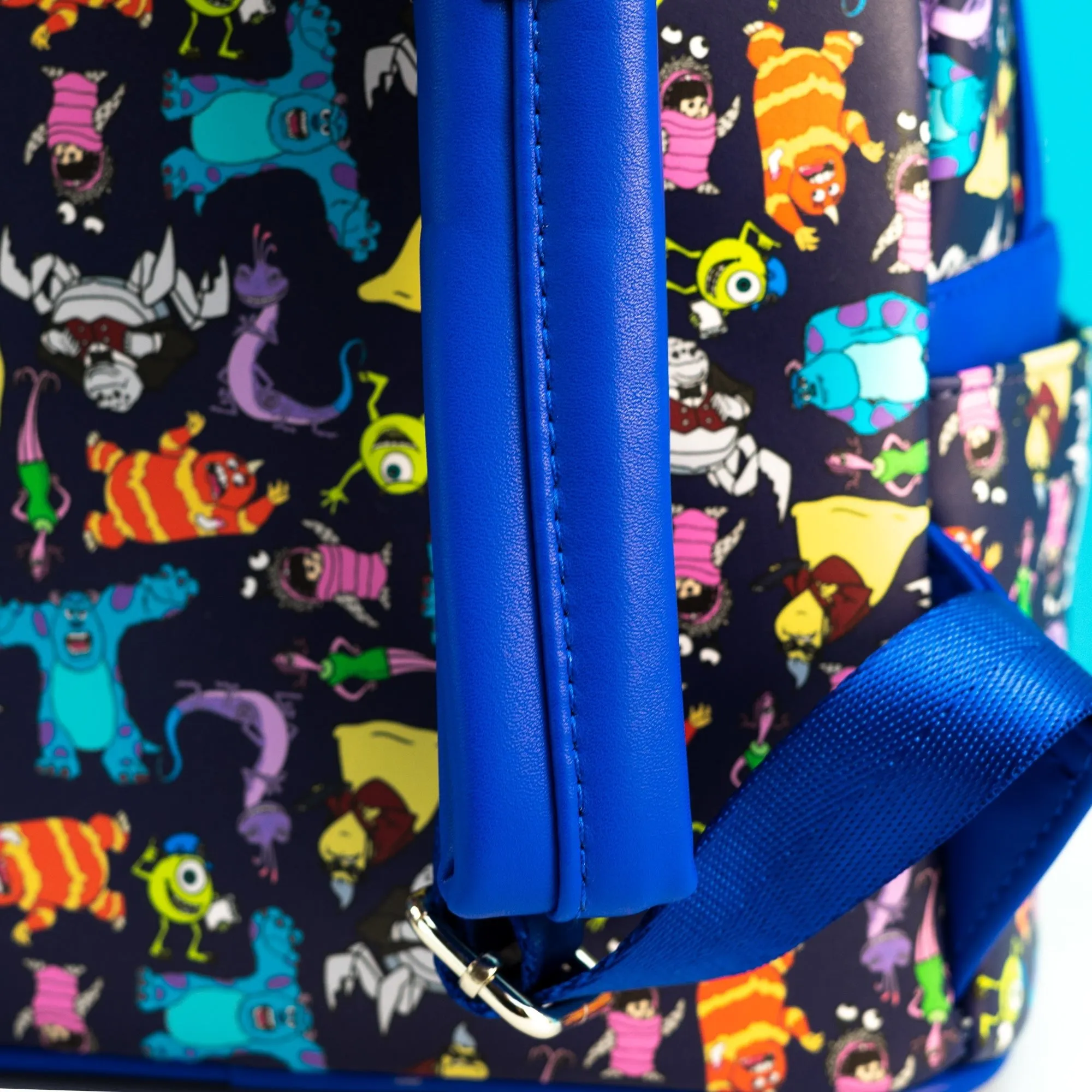 Loungefly x Disney Pixar Monsters Inc AOP Mini Backpack