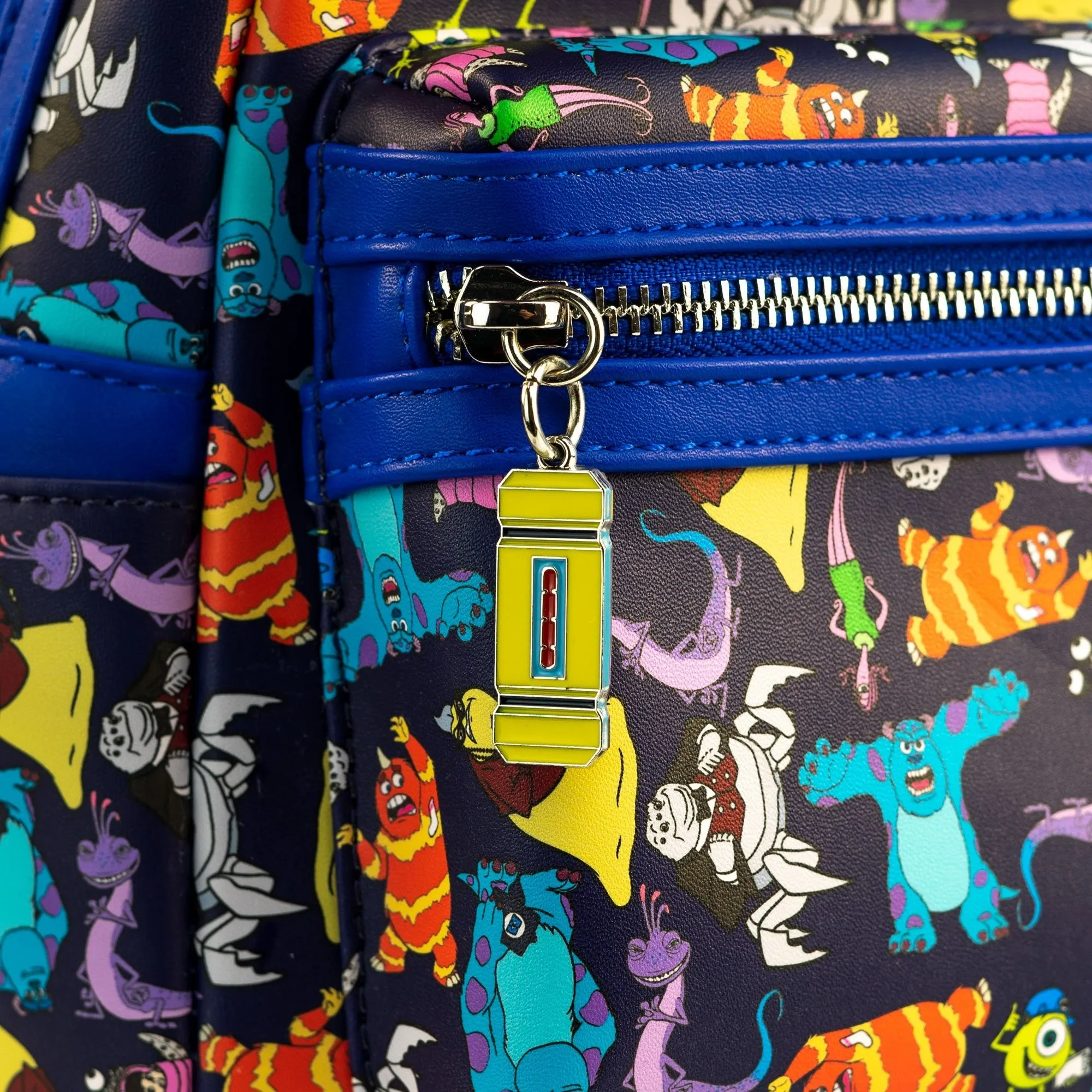 Loungefly x Disney Pixar Monsters Inc AOP Mini Backpack