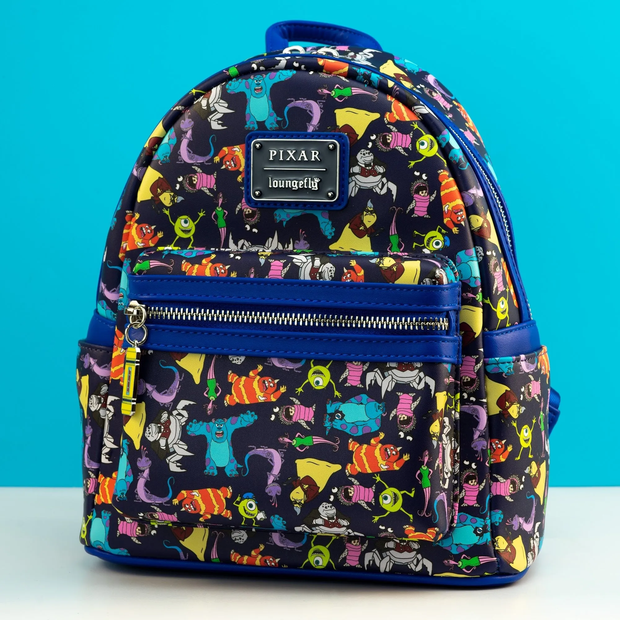 Loungefly x Disney Pixar Monsters Inc AOP Mini Backpack