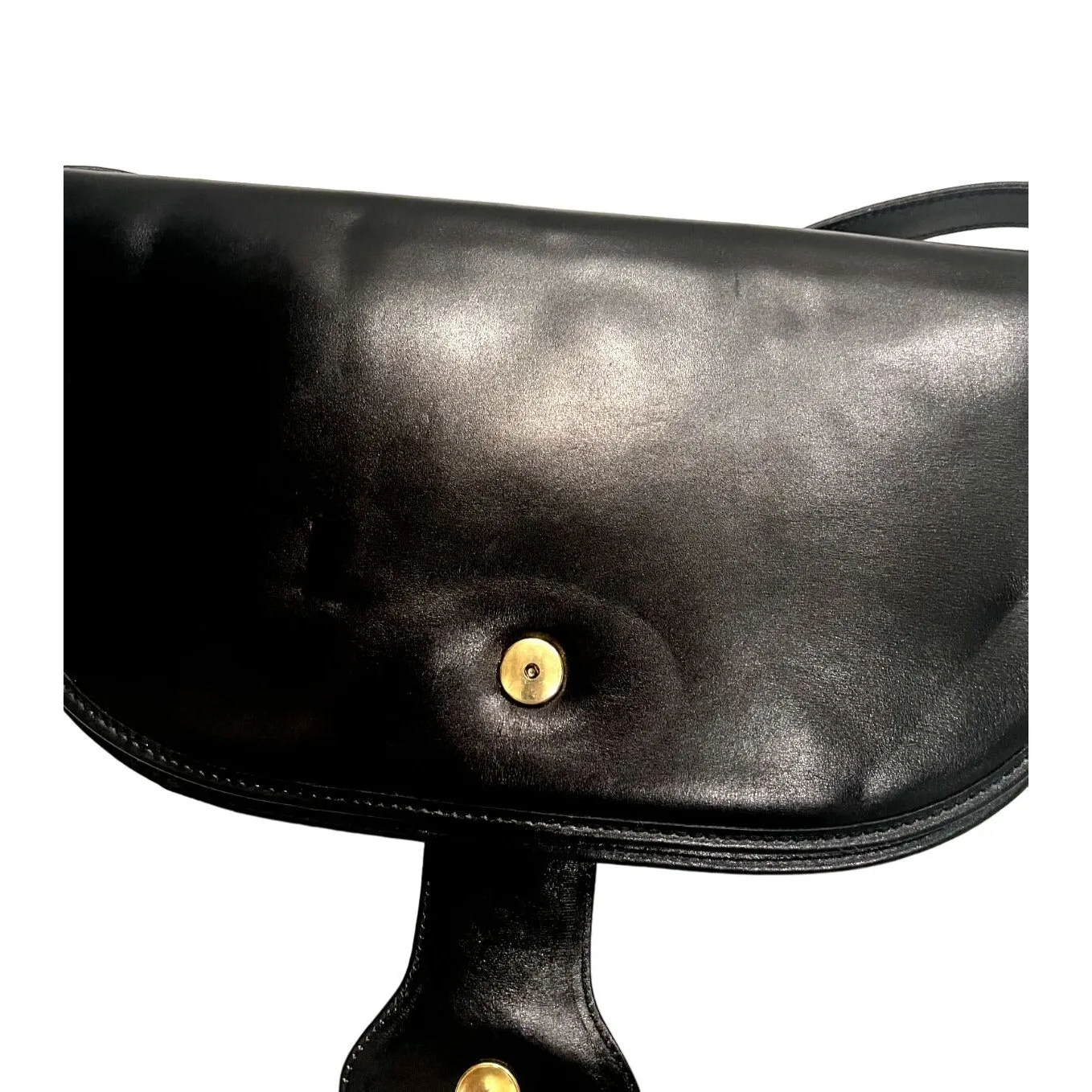Vintage, rare, black leather, Gucci shoulder bag with a large, two-tone 'GG' emblem and removable strap