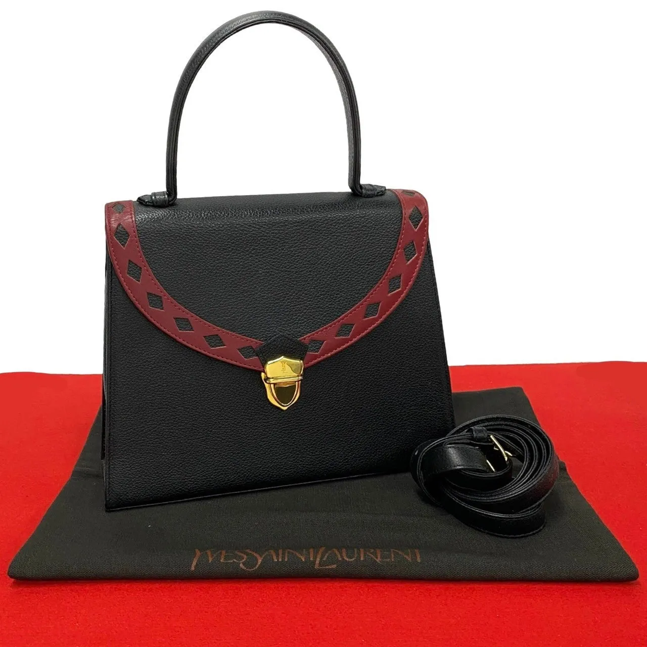 YVES SAINT LAURENT Shoulder Bag leather black YSL logo cut-out perforated leather Women Used